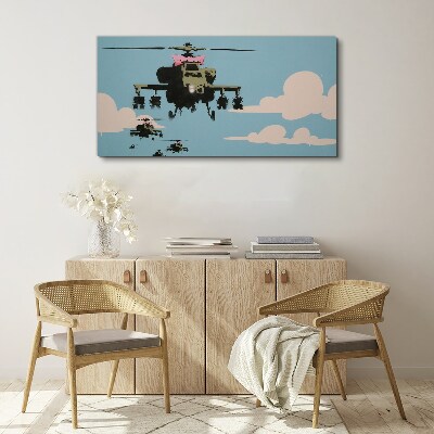 Vászonkép Helikopterek rózsaszín íjakban