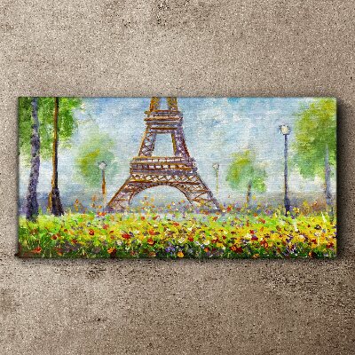 Vászonkép Az Eiffel-torony virágos környezetben