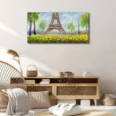 Vászonkép Az Eiffel-torony virágos környezetben