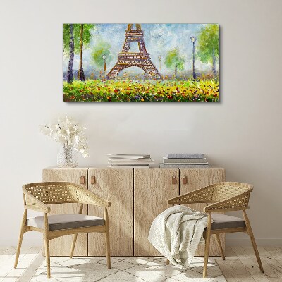 Vászonkép Az Eiffel-torony virágos környezetben