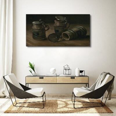 Vászonkép Antik bögrék az asztalon