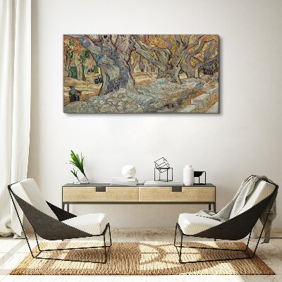 Vászonkép Fákkal szegélyezett utca tavaszi napsütésben