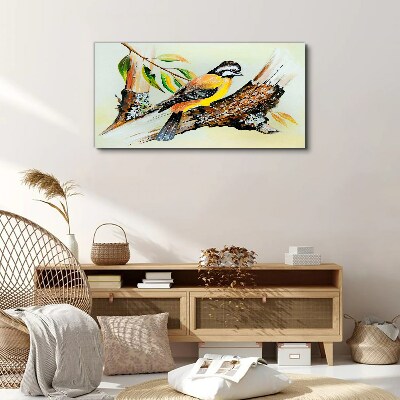 Vászonkép Madár egy ágon