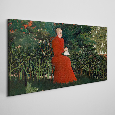 Vászonkép Piros kabát a kertben