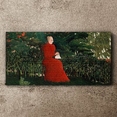 Vászonkép Piros kabát a kertben