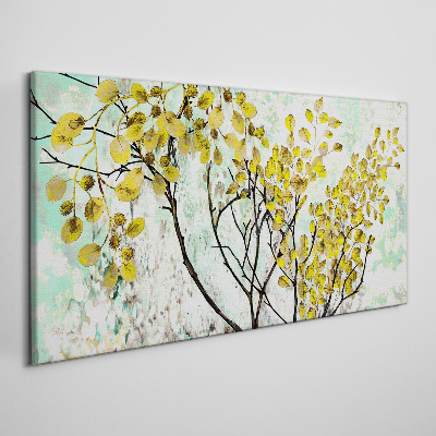 Vászonkép Tavaszi levelek a kék háttérrel