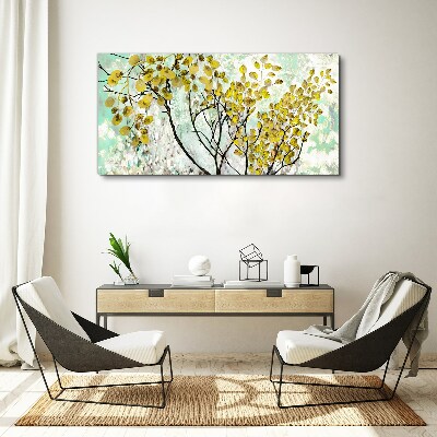 Vászonkép Tavaszi levelek a kék háttérrel