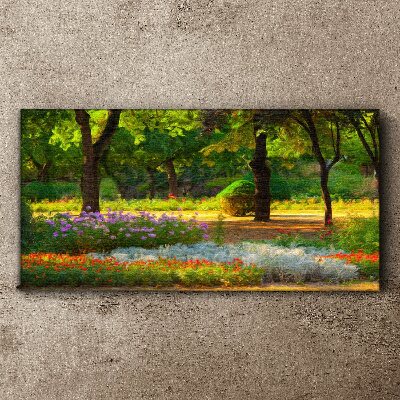 Vászonkép Virágos paradicsom egy napsütötte kertben