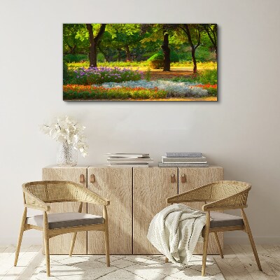 Vászonkép Virágos paradicsom egy napsütötte kertben