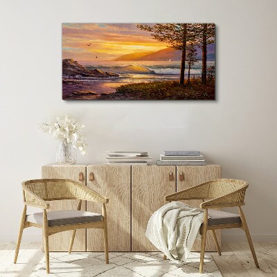 Vászonkép Naplemente a tenger partján