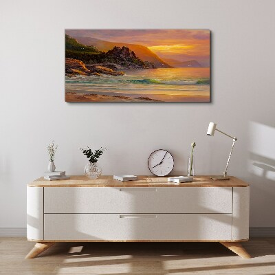 Vászonkép Naplemente a hegy partján