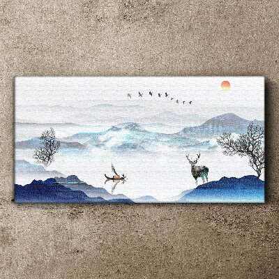 Vászonkép Békés hegyi táj egy szarvassal