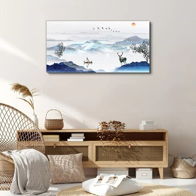 Vászonkép Békés hegyi táj egy szarvassal