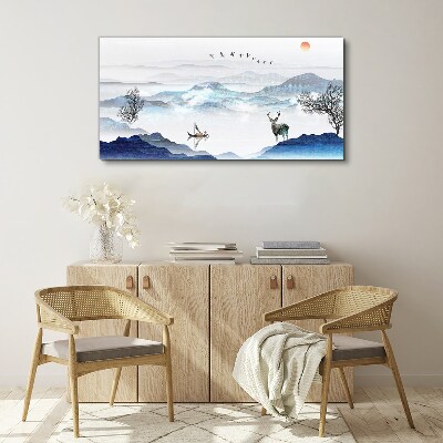 Vászonkép Békés hegyi táj egy szarvassal