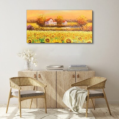 Vászonkép Napraforgó mezők és falusi házak