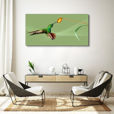 Vászonkép Kolibri egy virágnál