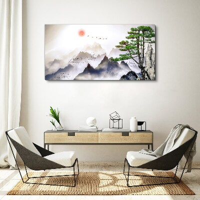 Vászonkép Hegyek és madarak a reggeli fényben