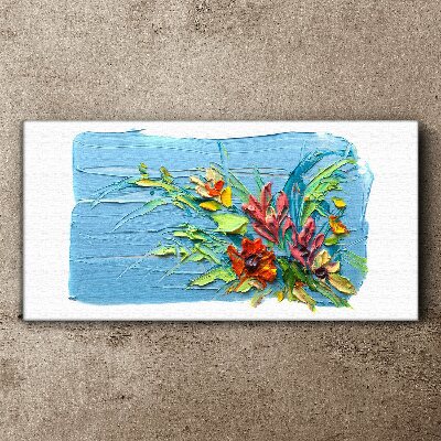 Vászonkép Virágok kék alapon