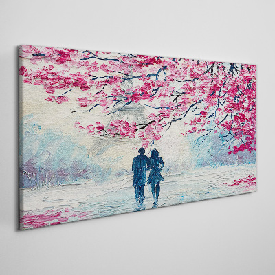 Vászonkép Tavaszi séta a virágzó fák alatt