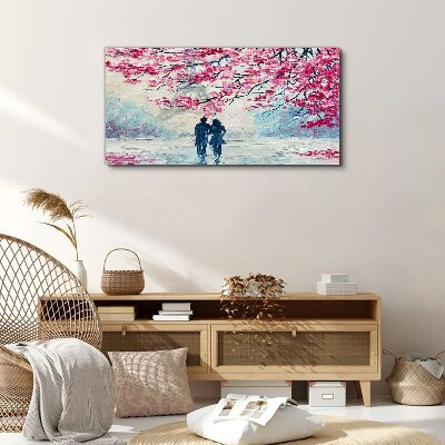 Vászonkép Tavaszi séta a virágzó fák alatt