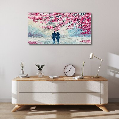 Vászonkép Tavaszi séta a virágzó fák alatt