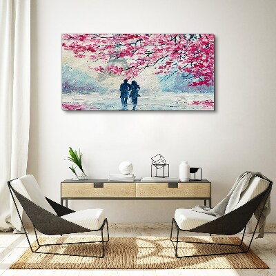 Vászonkép Tavaszi séta a virágzó fák alatt