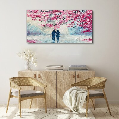 Vászonkép Tavaszi séta a virágzó fák alatt