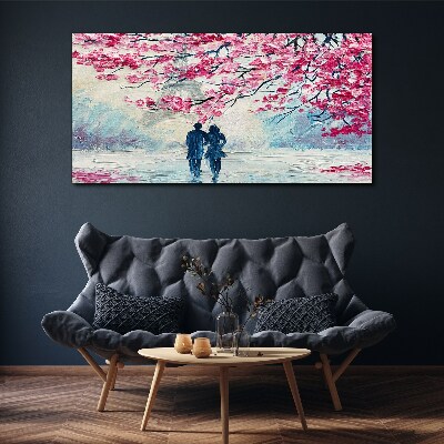 Vászonkép Tavaszi séta a virágzó fák alatt