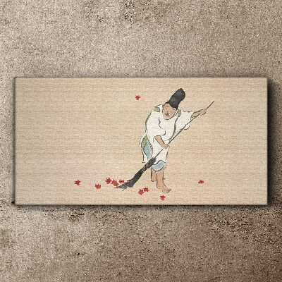 Vászonkép Szerzetes tisztítás levelekkel