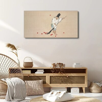 Vászonkép Szerzetes tisztítás levelekkel