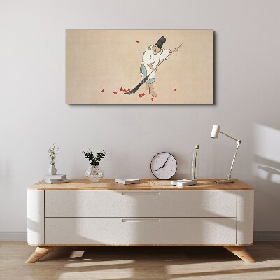 Vászonkép Szerzetes tisztítás levelekkel