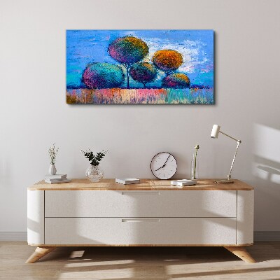 Vászonkép Színes fák kék alapon