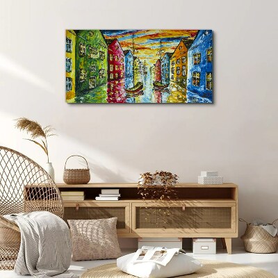 Vászonkép Színes sorházak a folyó mellett