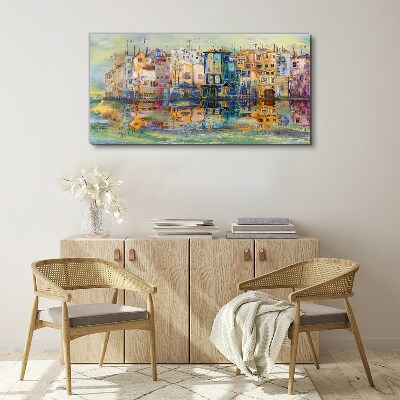 Vászonkép Színes város a víz mellett