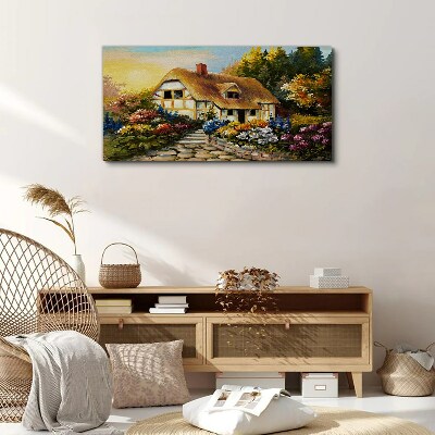 Vászonkép Bájos vidéki házikó virágokban