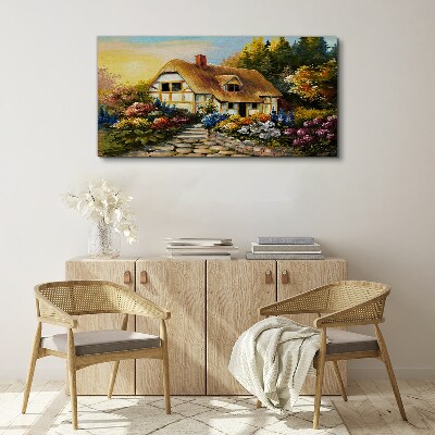 Vászonkép Bájos vidéki házikó virágokban