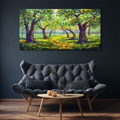 Vászonkép Zöld liget a nap sugaraiban