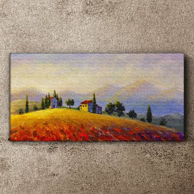 Vászonkép Napos táj házakkal a dombon