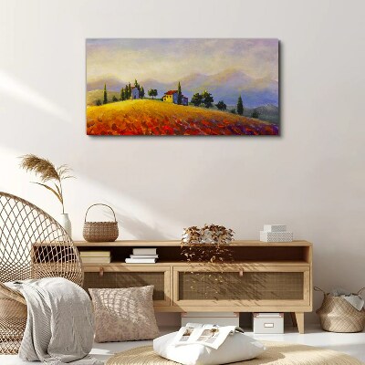 Vászonkép Napos táj házakkal a dombon