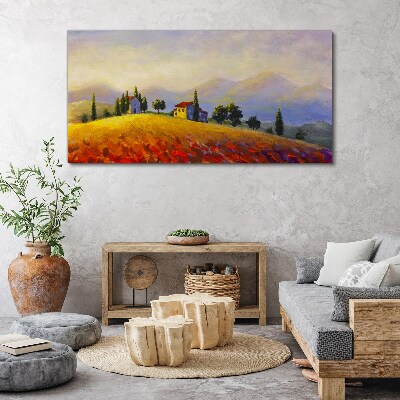 Vászonkép Napos táj házakkal a dombon