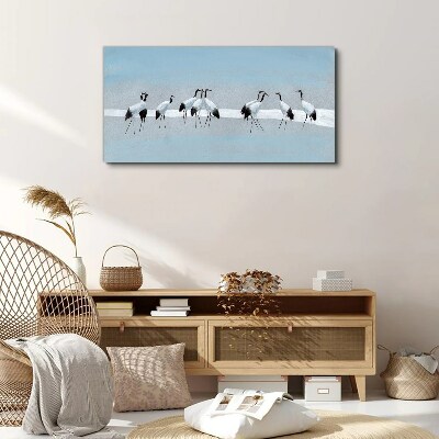 Vászonkép Darurajok kék alapon