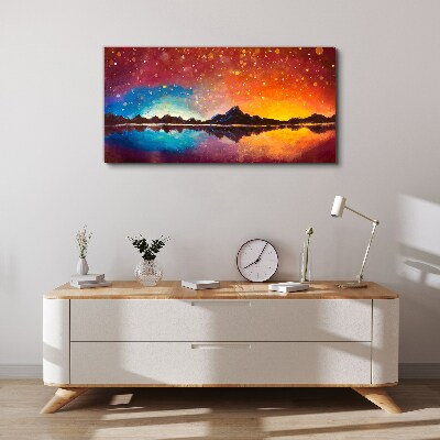 Vászonkép Naplemente egy hegyi tó felett