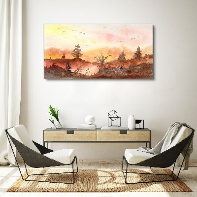 Vászonkép Naplemente egy erdei táj felett