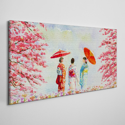 Vászonkép Tavaszi séta a virágzó fák alatt