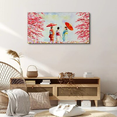 Vászonkép Tavaszi séta a virágzó fák alatt