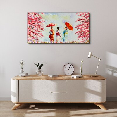 Vászonkép Tavaszi séta a virágzó fák alatt