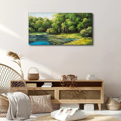 Vászonkép Zöld táj a víz felett