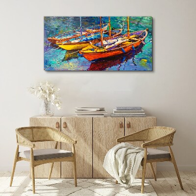 Vászonkép Színes csónakok nyugodt vízen