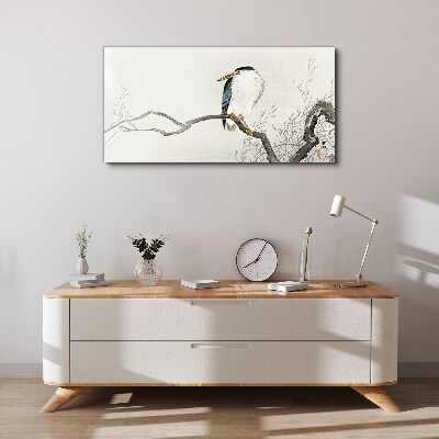 Vászonkép Egy madár egy ágon egy finom tájon