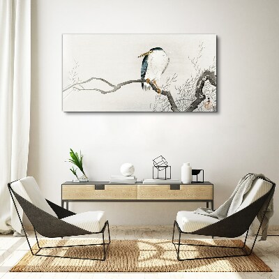 Vászonkép Egy madár egy ágon egy finom tájon